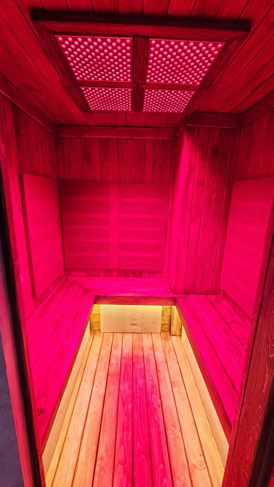 Inside the infrared and red-light sauna cabin at Ōmni Space