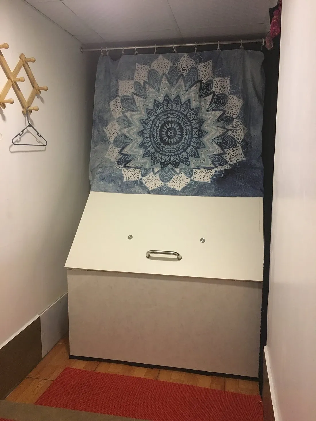 A closed, lidded Samadhi-style float tank in a small private room at Float Vietnam, Hanoi