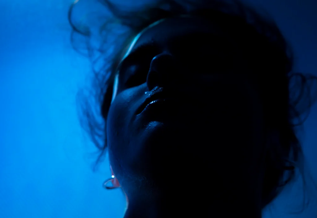 Floating in a dark float room pool